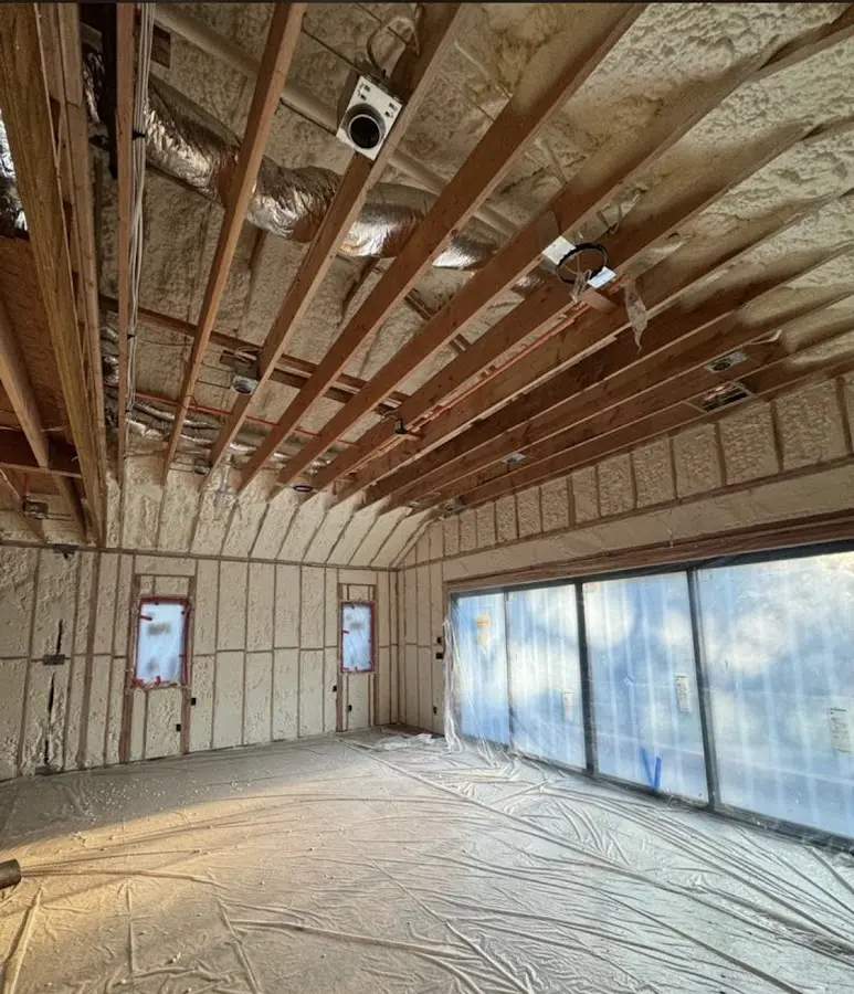 Interior walls and ceiling insulated with spray foam during new construction in Randallstown